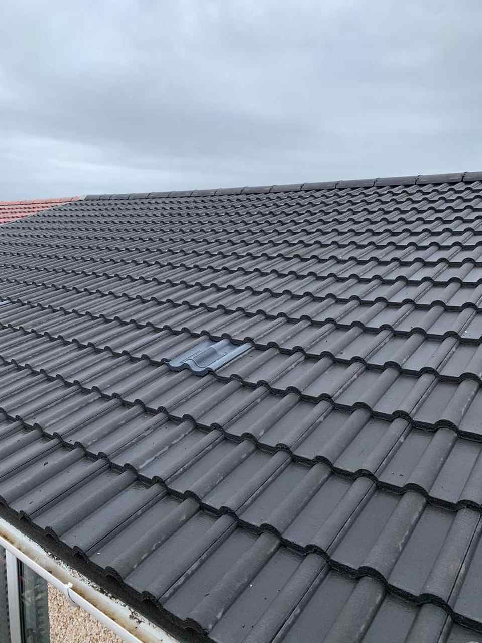 Repaired tiled roof