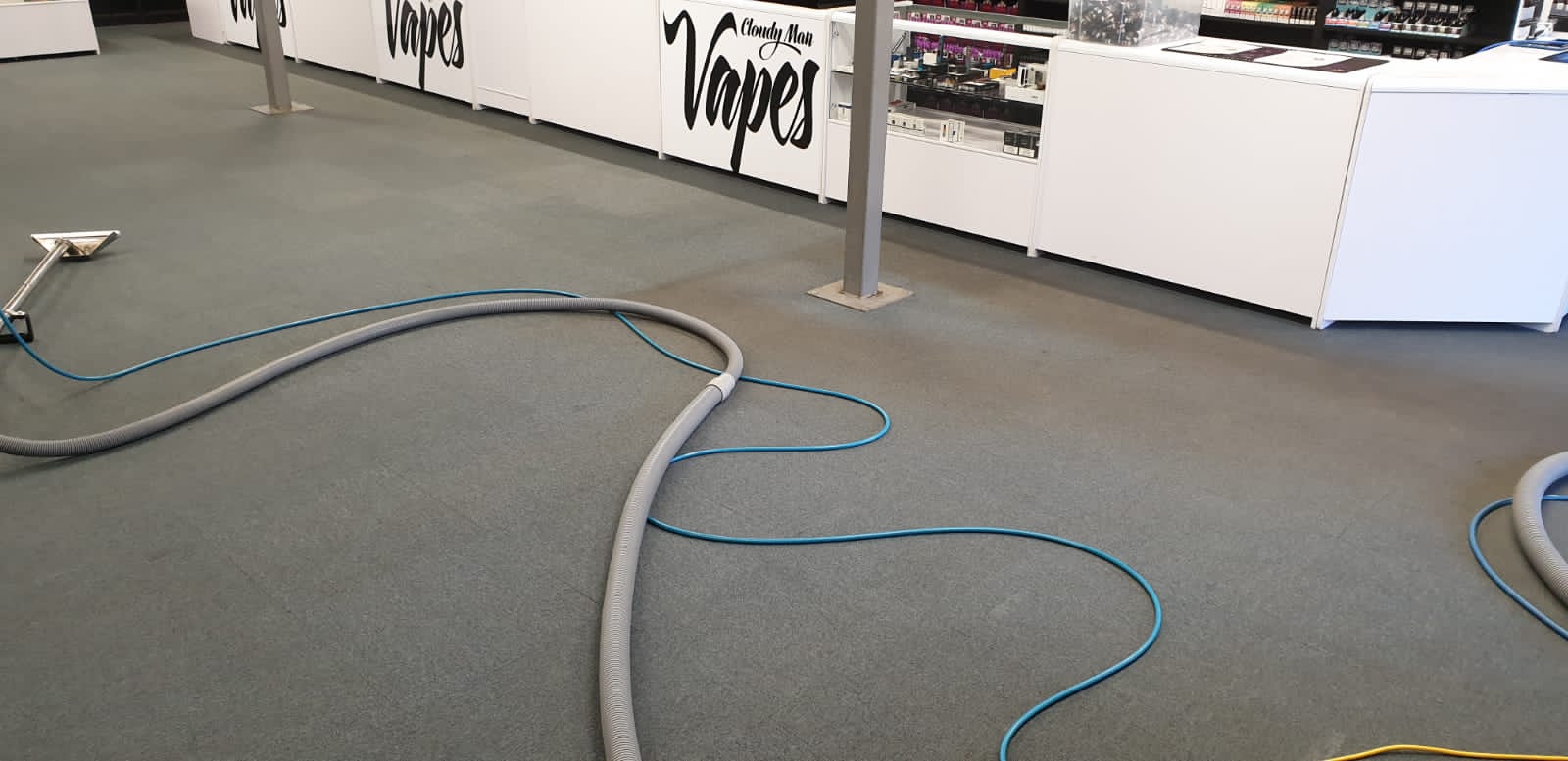 Carpet being cleaned in a shop