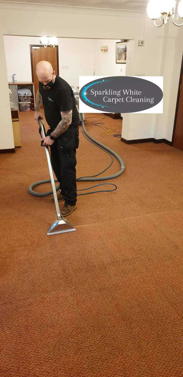 Commercial carpet being cleaned