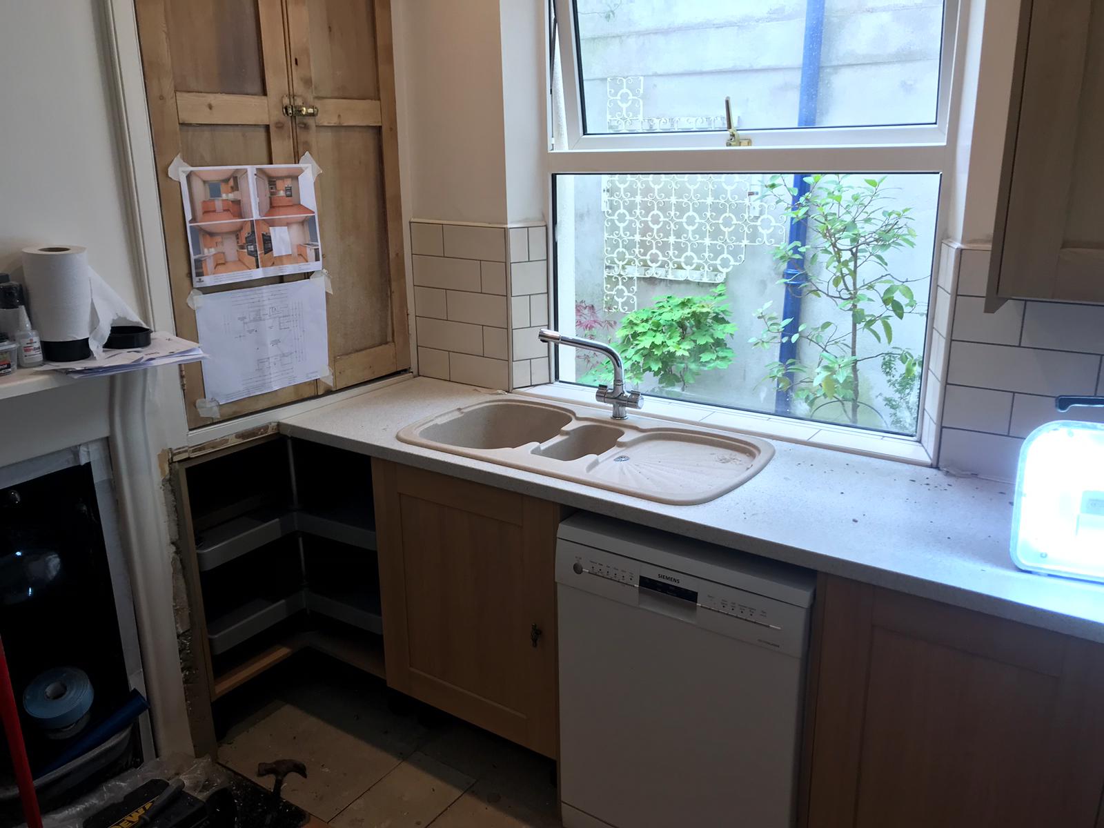 Sink and washing machine installed