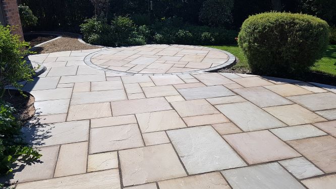 paved patio with feature circle