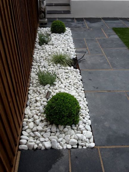 landscaped border and patio